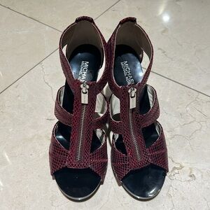 Eggplant colored snakeskin Michael Kors heels! New, never been worn.